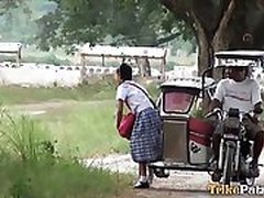 Asian schoolgirl giving head outdoors